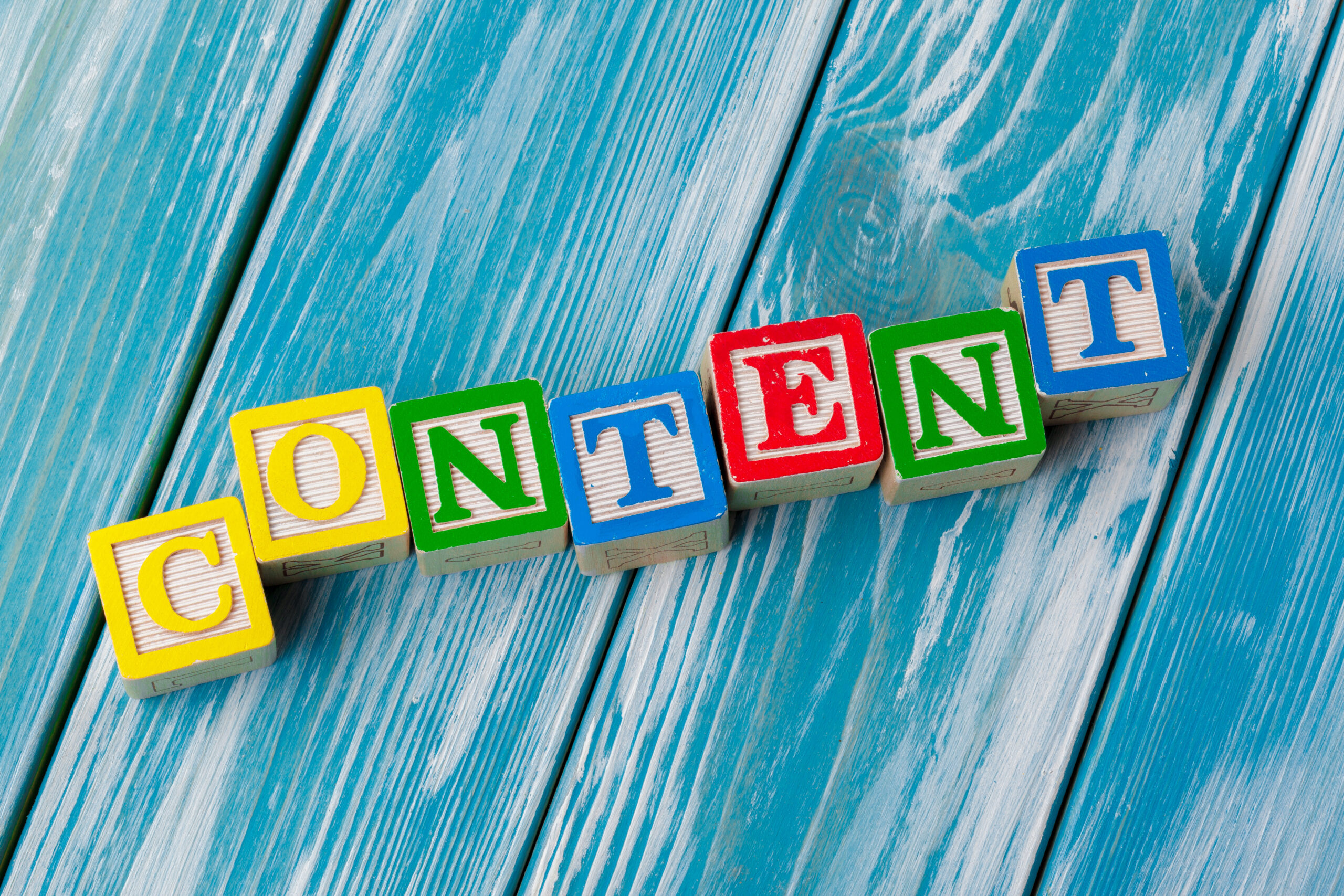 wooden toy blocks with the text: content